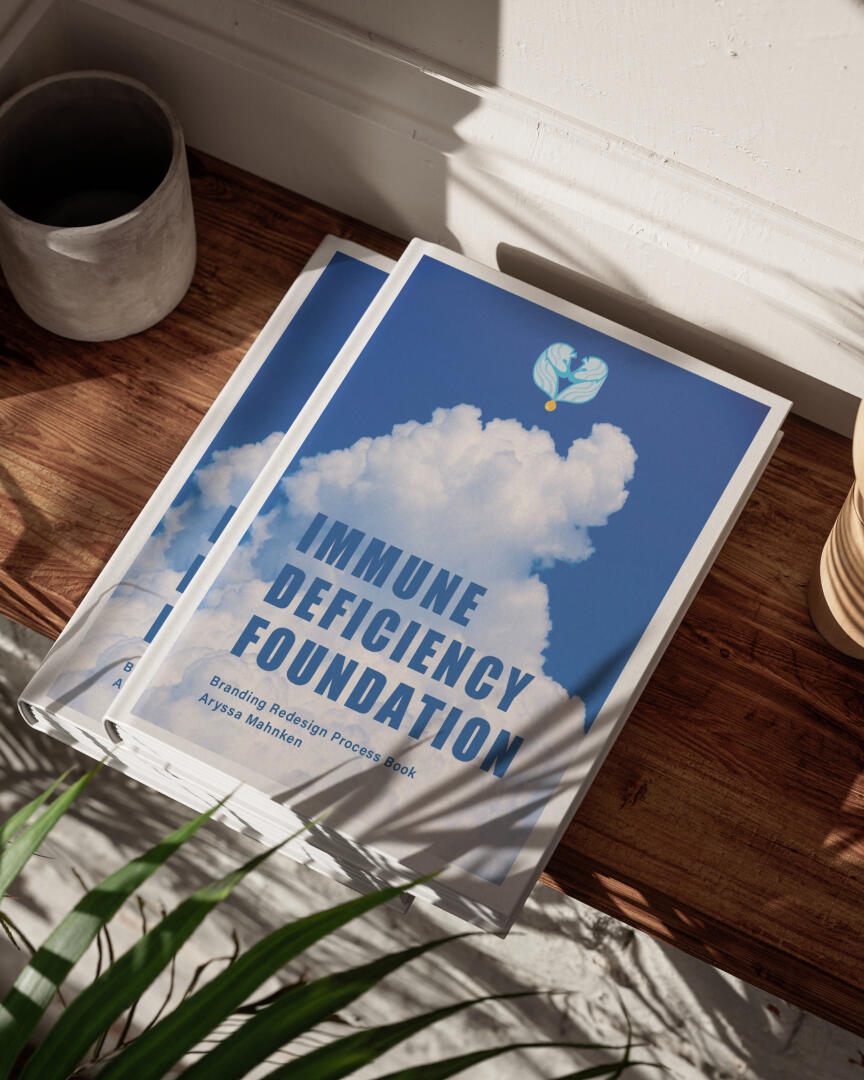 Mockup of Immune Deficiency Foundation branding redesign process book.