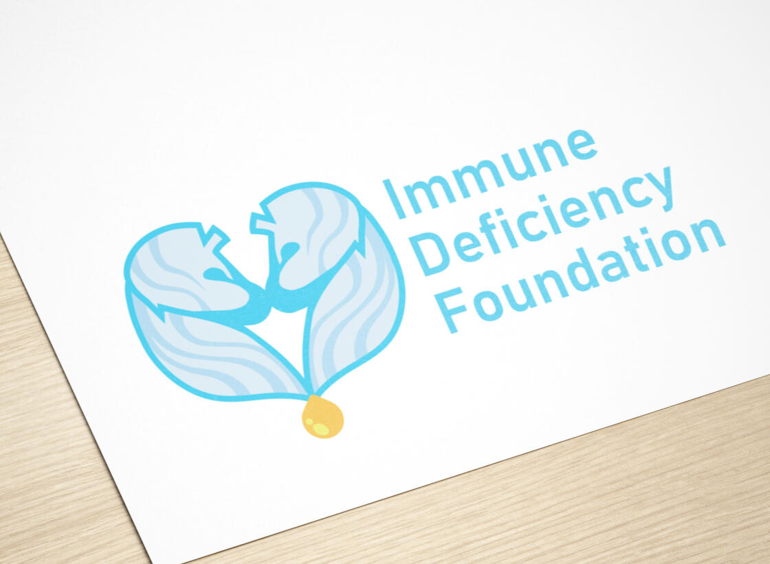 Mockup of new logo on a piece of paper.